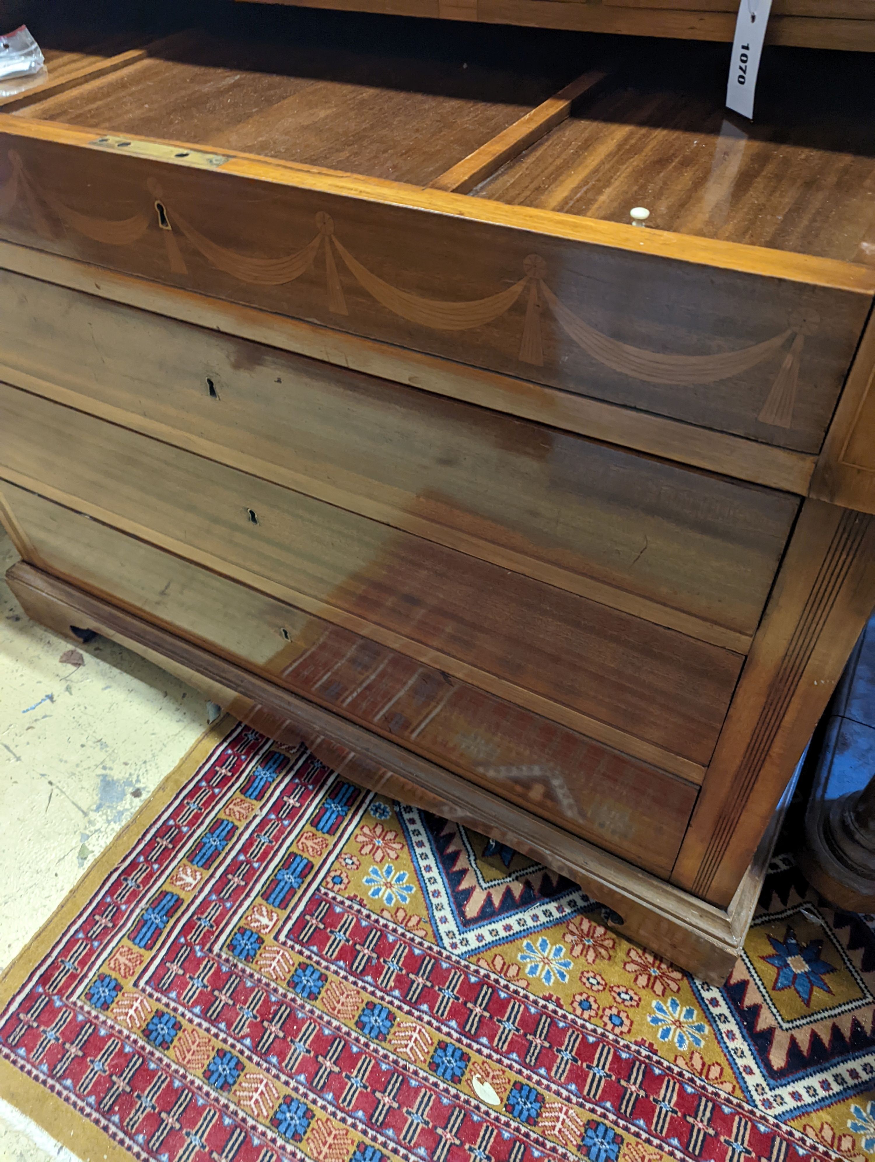 A reproduction inlaid mahogany cylinder bureau, width 110cm, depth 58cm, height 115cm